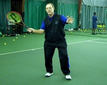 Coach Des demonstrates a forehand volley