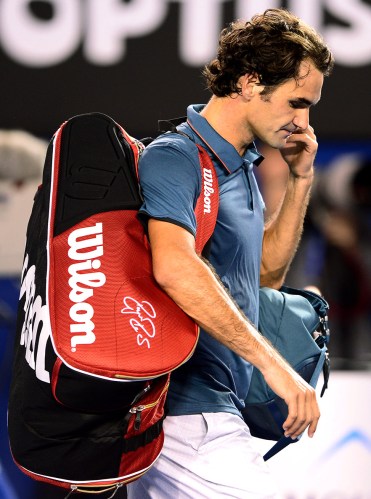 Roger Federer departs after encountering an on form Nadal