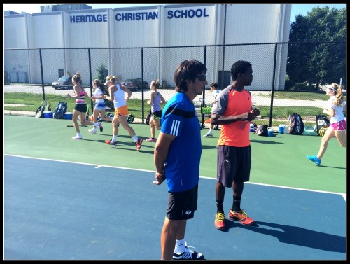 Coaches Hector Clavijo and Sule Ladipo running their elite players' group