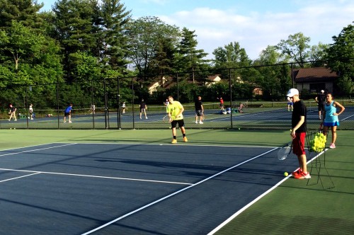 Sam, Luke and Haley performing a groundstroke drill