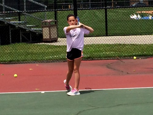 Hadley freezes her forehand follow through