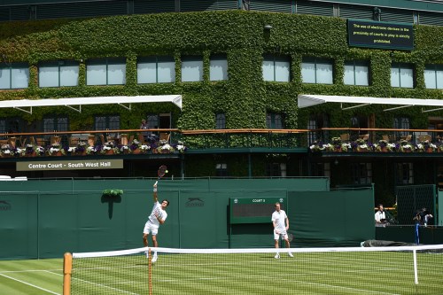 Roger Federer practising on court 5 with coach Stefan Edberg