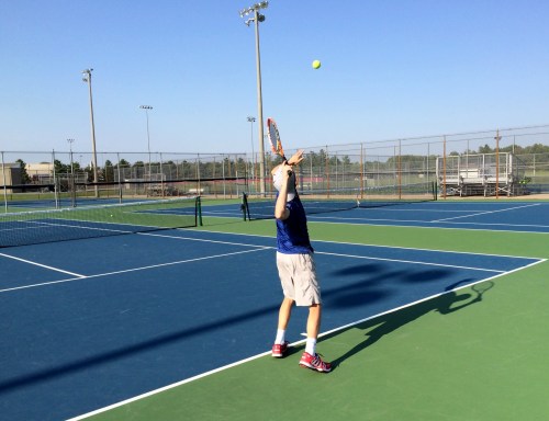 New Palestine's Matthew True working on his serve